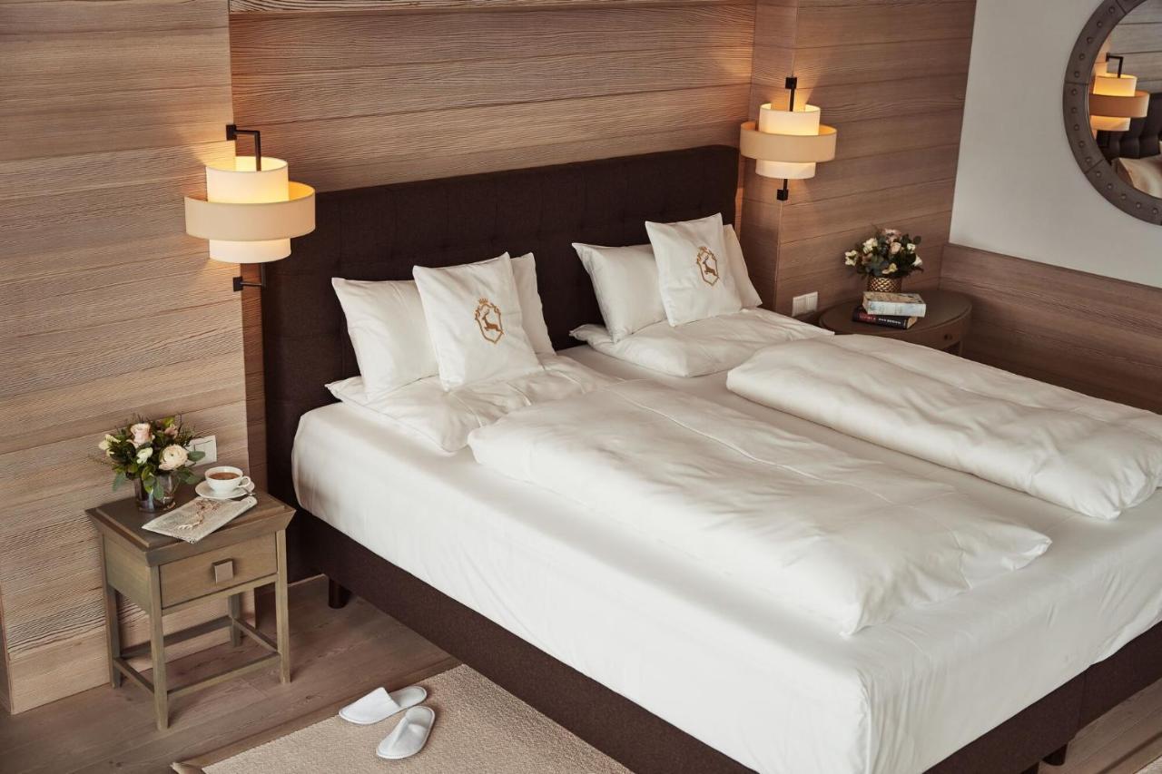 A-Rosa Ifen Hotel Kleinwalsertal Hirschegg  Bagian luar foto A bed with two mattresses